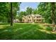 Two story house with a large front yard and mature trees at 1104 W Greencastle Road, Mooresville, IN 46158