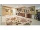 Finished basement with wet bar, rug, and rec area at 1104 W Greencastle Road, Mooresville, IN 46158