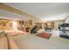 Finished basement recreation area with pool table, wet bar, and home gym at 1104 W Greencastle Road, Mooresville, IN 46158
