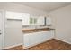 Kitchen with white cabinets and laminate counters at 945 Eugene St, Indianapolis, IN 46208