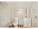 Clean bathroom with shower/tub combo, toilet, and vanity at 945 Eugene St, Indianapolis, IN 46208