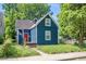 Blue house with red door and small porch at 945 Eugene St, Indianapolis, IN 46208