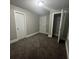 Spacious bedroom with neutral carpeting and double closets at 815 W 22Nd St, Anderson, IN 46016