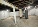 Unfinished basement with high ceilings and ample storage space at 815 W 22Nd St, Anderson, IN 46016