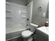 Clean bathroom with a tub shower combo and updated vanity at 815 W 22Nd St, Anderson, IN 46016