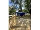 Wooden deck overlooking a backyard with a blue shed at 815 W 22Nd St, Anderson, IN 46016