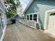 Wooden deck with grill and view of home's exterior at 808 E Minnesota St, Indianapolis, IN 46203