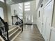 Spacious entryway with stairs, high ceilings, and an abundance of natural light at 808 E Minnesota St, Indianapolis, IN 46203