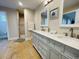 Double vanity bathroom with a large walk-in shower, providing ample space at 808 E Minnesota St, Indianapolis, IN 46203