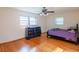 Bright bedroom with hardwood floors and a double bed at 2129 Woodcrest Rd, Indianapolis, IN 46227