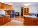 Eat-in kitchen with wood cabinets, and ample counter space at 2129 Woodcrest Rd, Indianapolis, IN 46227