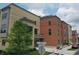 Modern townhome building showcasing brick and neutral colors at 98 E Wayne St # D, Franklin, IN 46131