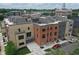 Aerial view of townhomes with multiple color brick exteriors at 98 E Wayne St # D, Franklin, IN 46131