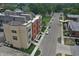 Aerial view of a modern apartment building, showcasing its contemporary design and surrounding neighborhood at 98 E Wayne St # D, Franklin, IN 46131