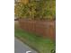 Wooden fence with lattice top, offering privacy at 643 Pratt St, Greenfield, IN 46140