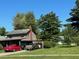 One-story home with a large yard and mature trees at 643 Pratt St, Greenfield, IN 46140