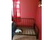 Small bedroom with metal daybed frame at 643 Pratt St, Greenfield, IN 46140