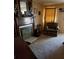 Living room with fireplace and wood paneling at 643 Pratt St, Greenfield, IN 46140