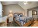 Spacious bedroom with a queen-size bed and en-suite bathroom at 9650 Shasta Dr, Fishers, IN 46038