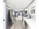 Modern kitchen with stainless steel appliances and white cabinets at 1136 W 35Th St, Indianapolis, IN 46208