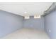Unfinished basement with concrete floor and windows at 1136 W 35Th St, Indianapolis, IN 46208