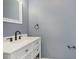 Modern bathroom with white vanity and quartz countertop at 1136 W 35Th St, Indianapolis, IN 46208