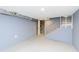 Unfinished basement with concrete floor and stairs at 1136 W 35Th St, Indianapolis, IN 46208