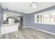 Open concept dining area features a breakfast bar and updated kitchen at 1136 W 35Th St, Indianapolis, IN 46208