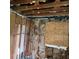 Bathroom under renovation, showing exposed framing and walls at 6380 E 10Th St, Indianapolis, IN 46018