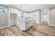 Modern kitchen with white cabinets and granite countertops at 3368 Johns Way, Greenwood, IN 46143