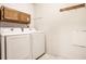 Laundry room with washer, dryer and cabinets at 4130 Robertson Ct, Indianapolis, IN 46228