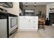 White kitchen cabinets with granite countertop at 102 Clarendon Dr # 409, Noblesville, IN 46062