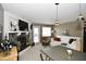 Open living space with kitchen, fireplace and lake view at 102 Clarendon Dr # 409, Noblesville, IN 46062