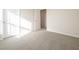 Bright bedroom with grey carpet and natural light at 233 Lucky Hat Ln, Danville, IN 46122