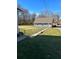 Side yard with walkway to detached garage at 6104 Madison Ave, Indianapolis, IN 46227