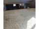Spacious loft area with neutral carpeting and wooden railing at 6104 Madison Ave, Indianapolis, IN 46227
