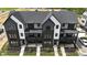 Modern three-unit townhome building with black and white exterior at 367 S Cherry St, Westfield, IN 46074