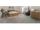 Main bedroom with wood-look flooring and a sitting area at 3691 Sycamore Bend N Way, Columbus, IN 47203