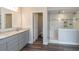 Elegant bathroom with double vanity and large shower at 3691 Sycamore Bend N Way, Columbus, IN 47203