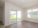 Dining area with sliding glass doors leading to backyard at 1448 Buttercup Ln, Shelbyville, IN 46176