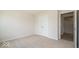 Bright bedroom with neutral walls and carpet at 1448 Buttercup Ln, Shelbyville, IN 46176