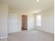 Primary bedroom with access to bathroom and closet at 1448 Buttercup Ln, Shelbyville, IN 46176