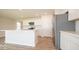 Modern kitchen with island, stainless steel appliances, and white cabinets at 1448 Buttercup Ln, Shelbyville, IN 46176