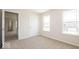 Bedroom with two windows and access to other rooms at 1448 Buttercup Ln, Shelbyville, IN 46176