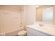 Clean bathroom with a bathtub, toilet and vanity at 1448 Buttercup Ln, Shelbyville, IN 46176