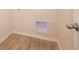 Laundry room with light flooring and built-in vent at 1448 Buttercup Ln, Shelbyville, IN 46176