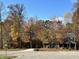 Ranch style home with attached garage on a wooded lot at 2131 N Wolf Den Ln, Martinsville, IN 46151