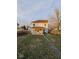 Home's backyard with a wooden deck and a grassy area at 213 E Broadway St, Alexandria, IN 46001