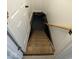 Unfinished basement with wooden stairs at 213 E Broadway St, Alexandria, IN 46001