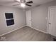 Bedroom with a closet and wood-look flooring at 213 E Broadway St, Alexandria, IN 46001